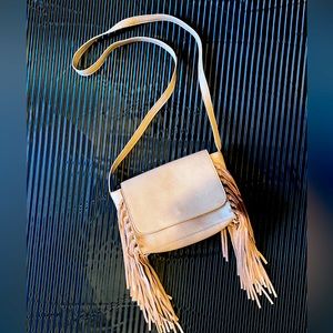 Light brown leather purse with leather fringe